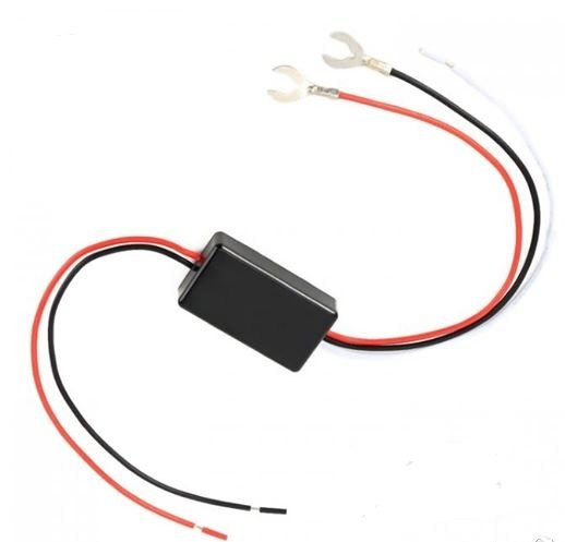 Реле / модул за автоматично пускане на фаровете или дневни светлини.